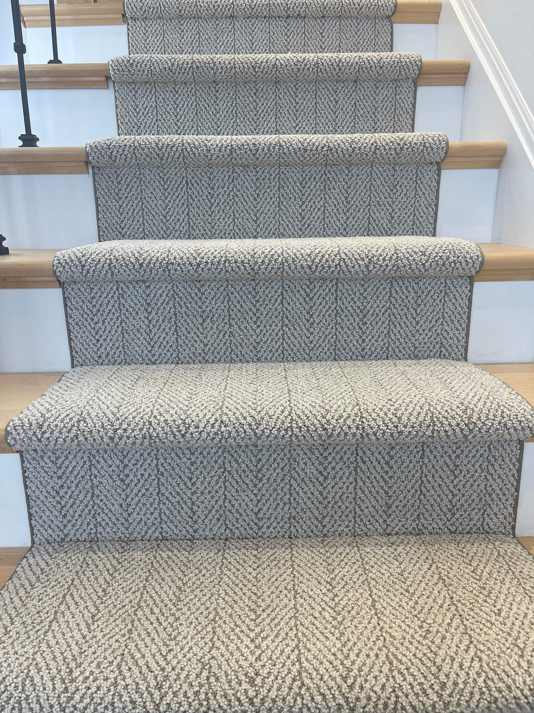 Full staircase view of Amalfi Paradise Modern Herringbone Stair Runner in neutral tones