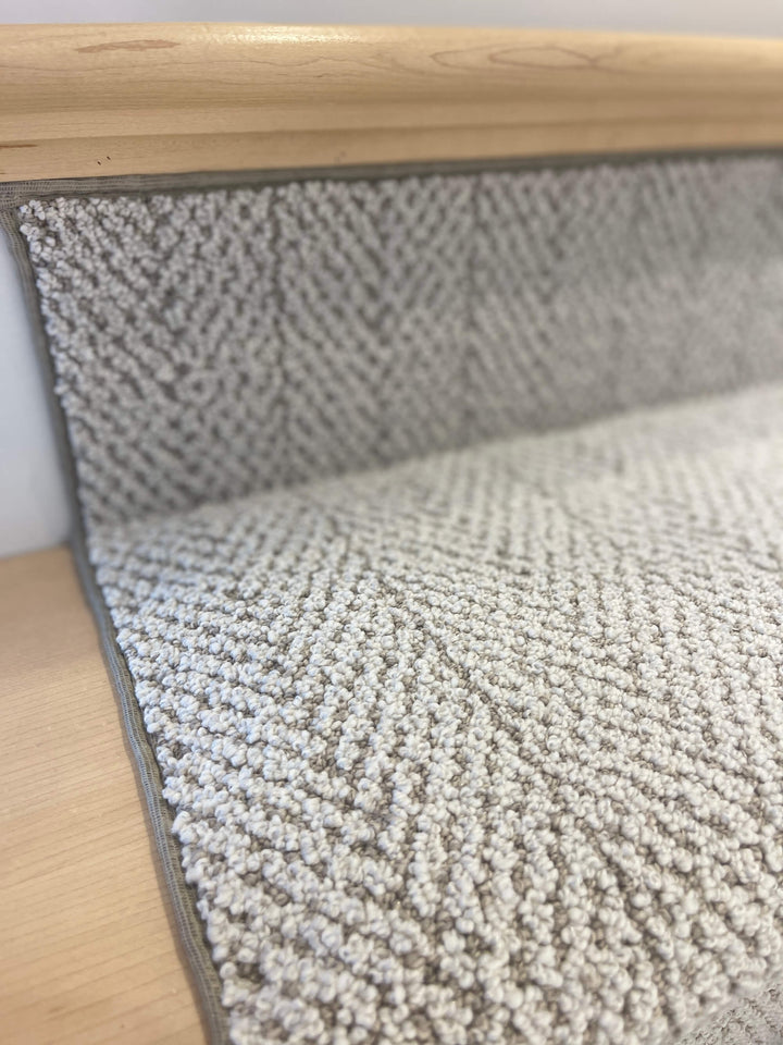Amalfi Paradise Modern Herringbone Stair Runner installed on stairs with a beige pattern