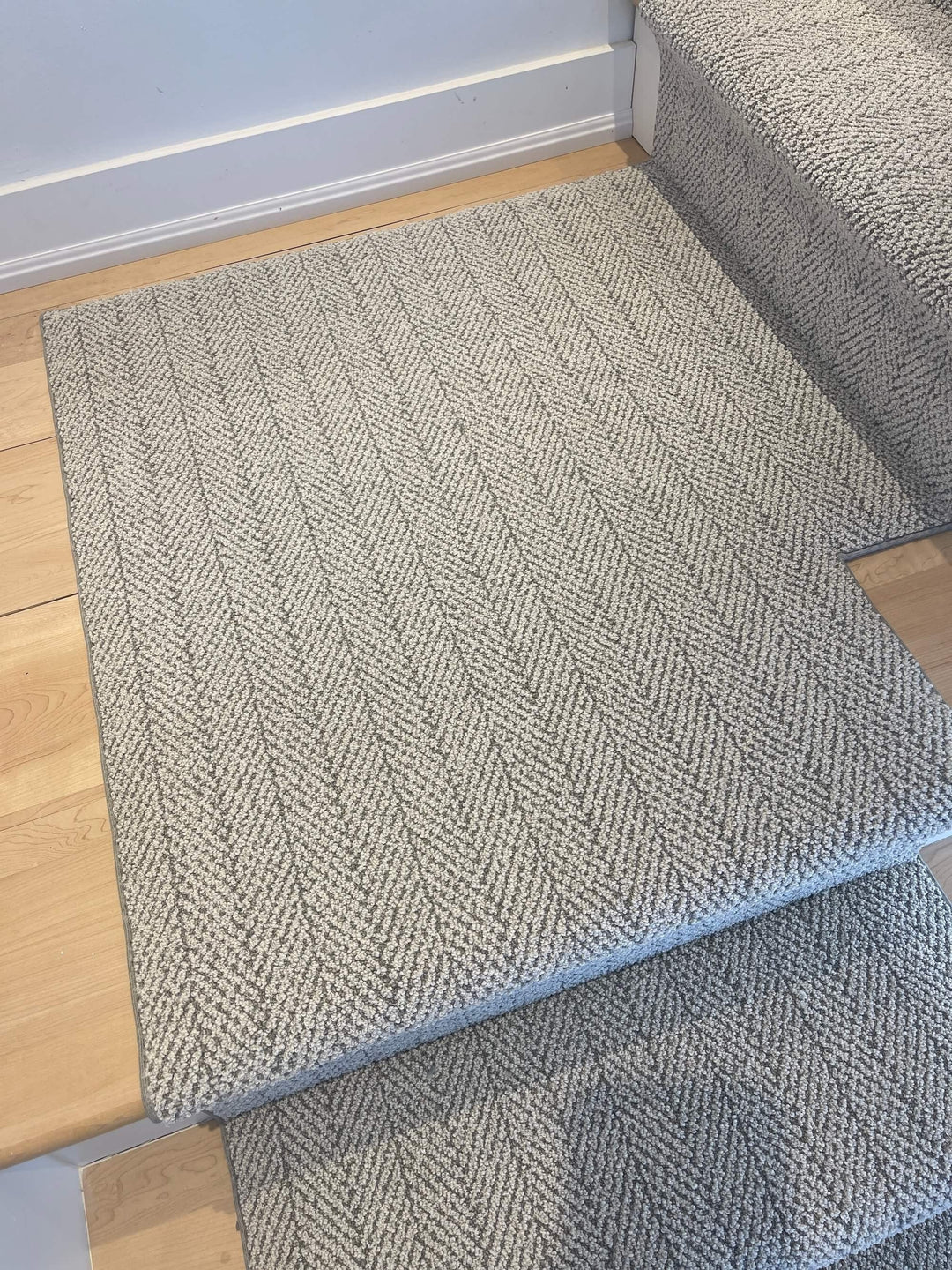 Amalfi Santa Marina Herringbone Stair Runner Landing Canada installed on a stair landing