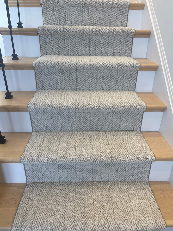 Close-up of Amalfi Spartis Herringbone Stair Runner texture showing beige and ivory weave
