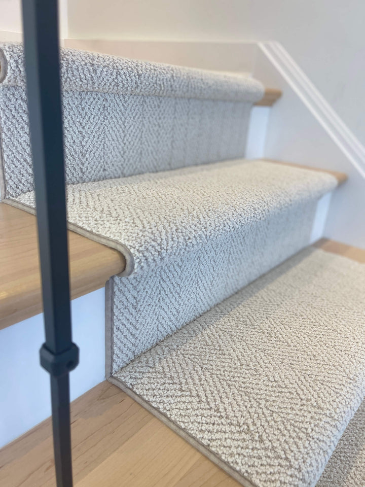 Rolled view of Amalfi Spartis Herringbone Stair Runner showing colour and pattern detail