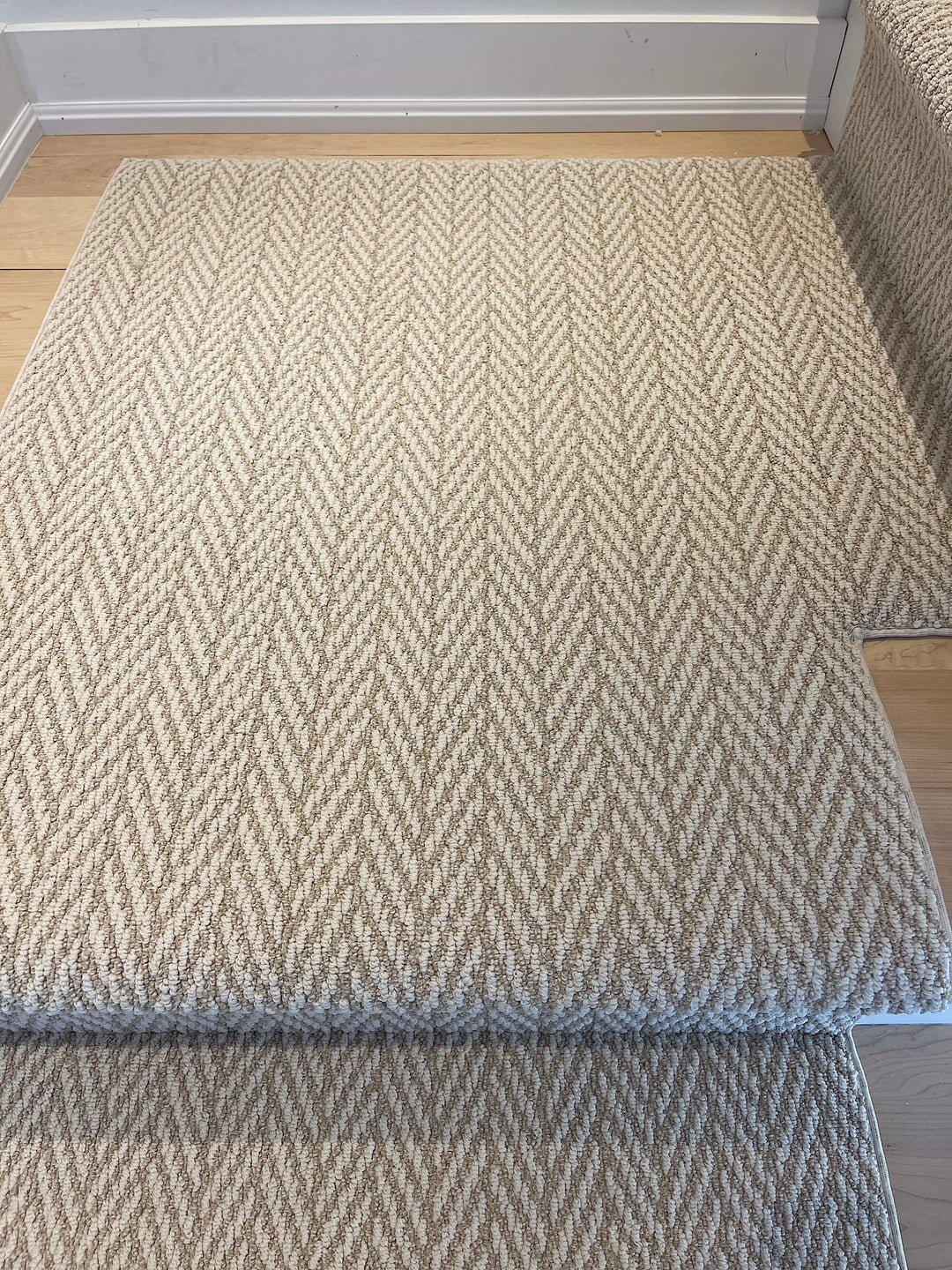 Close-up texture of Anderson Tuftex Boutique Stair Runner Landing Canada showing herringbone weave