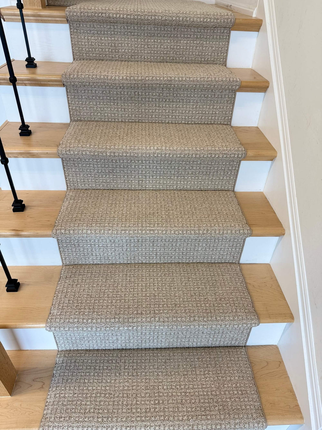 Full staircase view of Anderson Tuftex Fetch Birch Nylon Stair Runner Canada in light birch tones