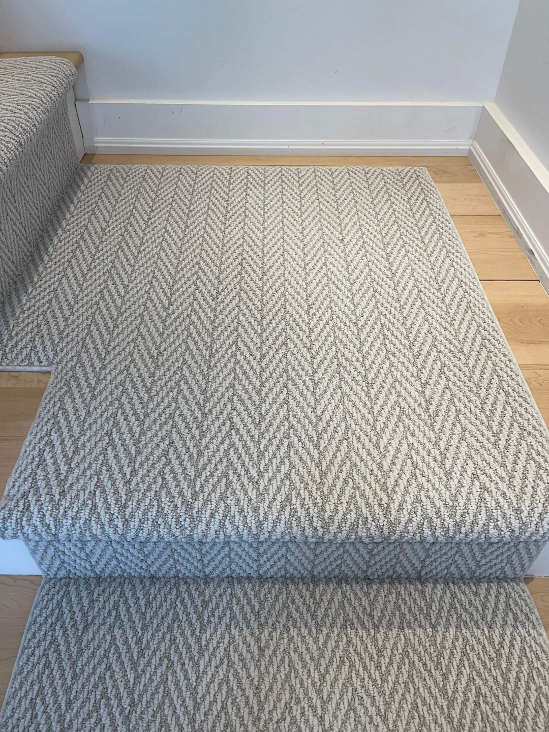Full view of Anderson Tuftex Foggy Stair Runner Landing Canada in soft gray tones