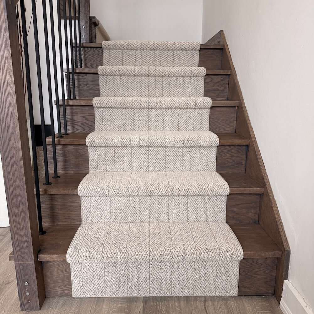 Amalfi Capri beige herringbone stair runner on wood stairs