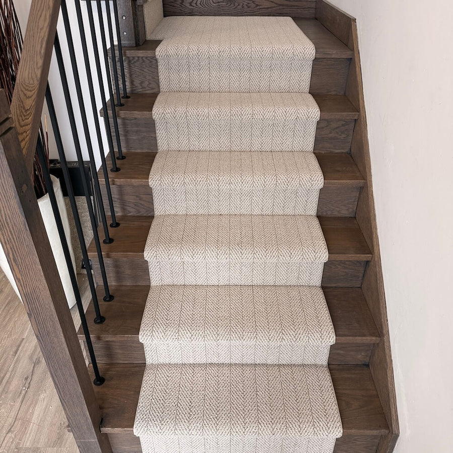 Capri herringbone stair runner installed on wooden staircase